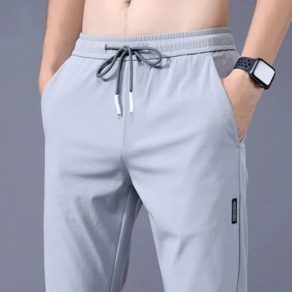New  Summer Elastic Men Running Sport Pants Jogging Sweatpants Casual Outdoor Training Gym Fitness Trousers Oversize M-5XL